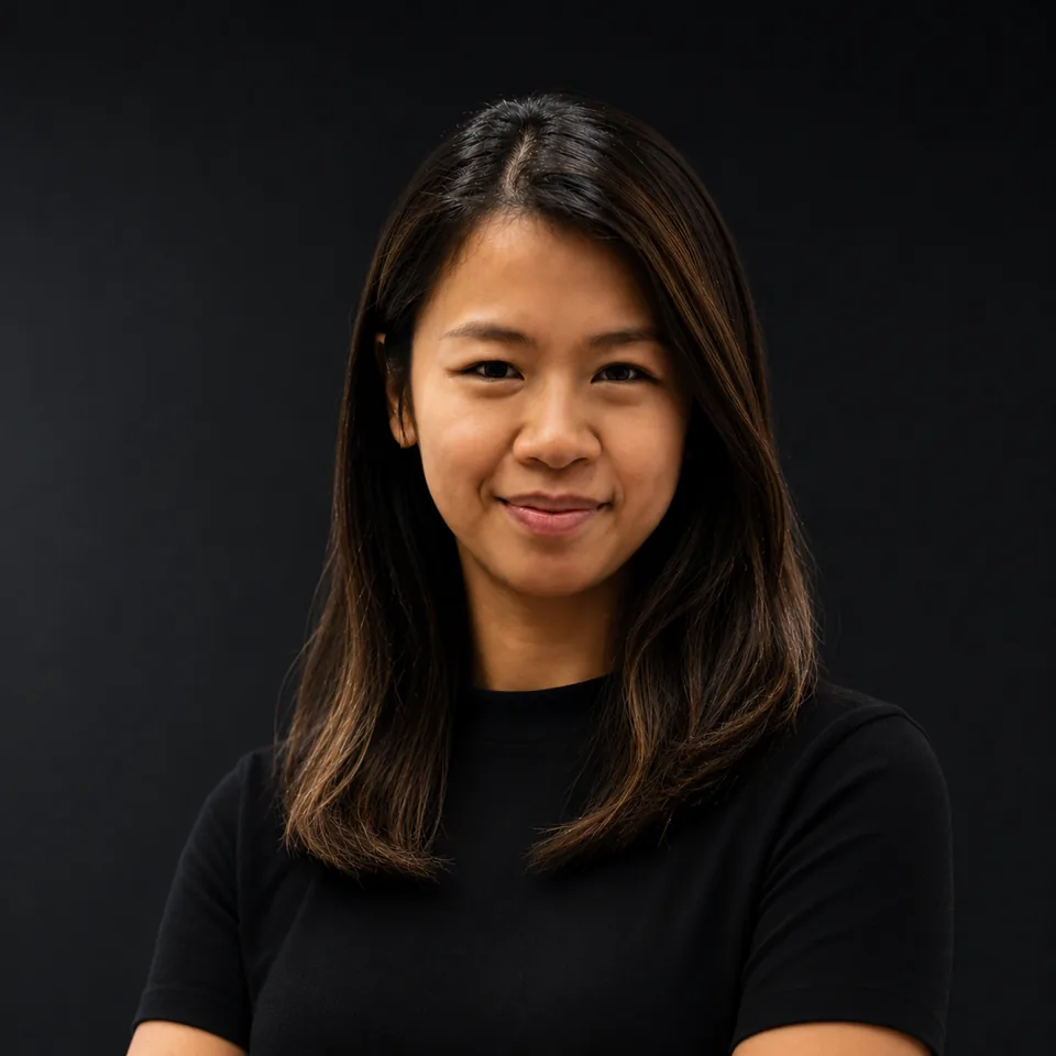 Echo Shih, a studio portrait against a dark background.