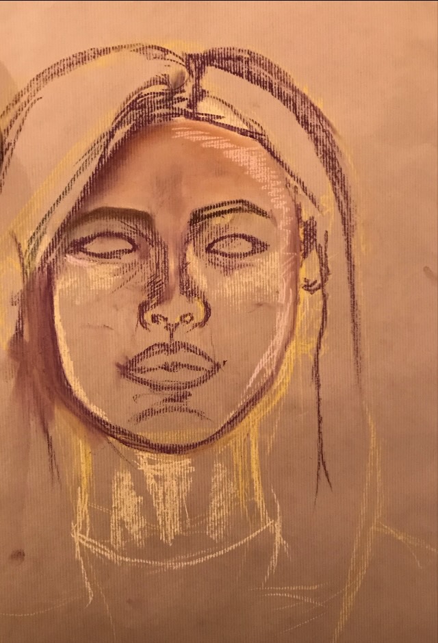 Charcoal and pastel drawing of a head seen straight on, on toned brown paper